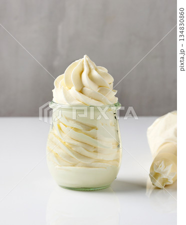 whipped cream in a glass jar whipped cream in a glass jar 134830860