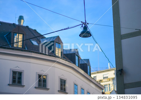 Suspended Streetlight Between European Buildings Suspended Streetlight Between European Buildings 134831095