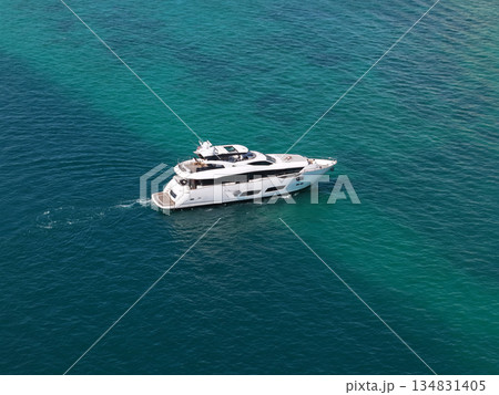 Yachting boat tourism. Luxury lifestyle. Vacation on summer. Yacht at sea. Motorboat yacht sailing at sea. Motorboat aerial top view. Travel destination. Luxury boat motor yacht at sea 134831405
