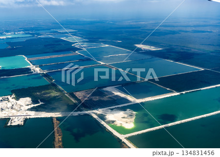 Aquaculture landscape. Aerial view of shrimp farm. Salt production landscape. Aquaculture and industry. Water field reservoir. Aerial landscape with water plant reservoir. Aquaculture business 134831456