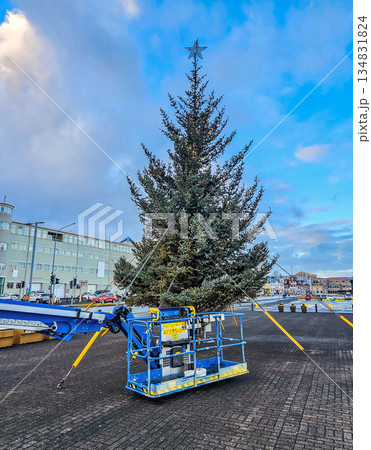 Installing Christmas Tree in City Square Using Aerial Lift 134831824