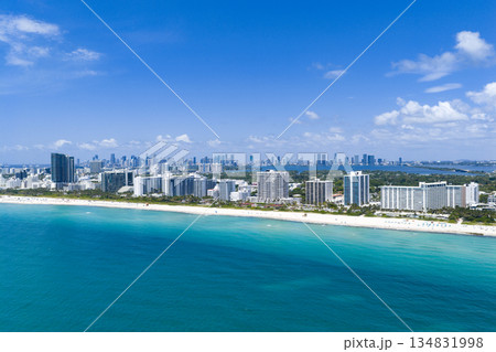 Drone aerial view of Miami sandy beach. Wide drone shot of Miami Beach and ocean. Drone aerial view of Miami sandy beach. Wide drone shot of Miami Beach and ocean. 134831998