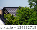 House roof with photovoltaic modules. Historic farm house with modern solar panels on roof and wall High quality photo 134832715