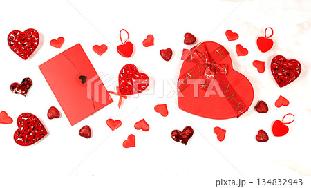 Celebration of Valentine's Day or Women's Day, Mother's Day, banner. Greeting card, roses, hearts and gift boxes on a wooden background, happy holiday, birthday greetings, selective focus 134832943