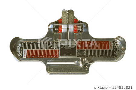 Vintage Foot Measuring Device isolated on a white background Vintage Foot Measuring Device isolated on a white background 134833821