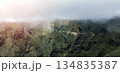 Green mountains and rocks in a foggy weather, scenic landscape with no people. 134835387