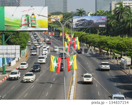 Myanmar Flags Flying Above a Highway Myanmar Flags Flying Above a Highway 134837154