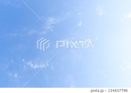 beautiful blue sky and white fluffy group of clouds with sunrise in the morning, natural background 134837796