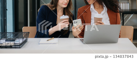 Business colleague business presents and explains and using laptop and tablet. Teamwork, financial marketing team, Business colleague business presents and explains and using laptop and tablet. Teamwork, financial marketing team, 134837843