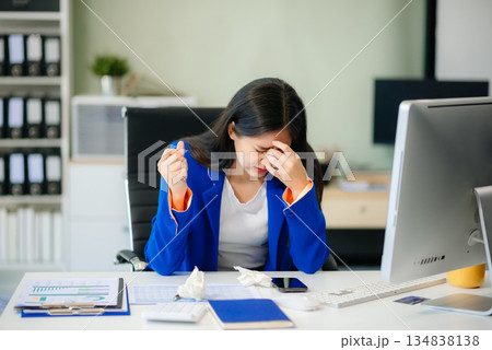 Asian woman is stressed, bored, and overthinking from working Asian woman is stressed, bored, and overthinking from working 134838138