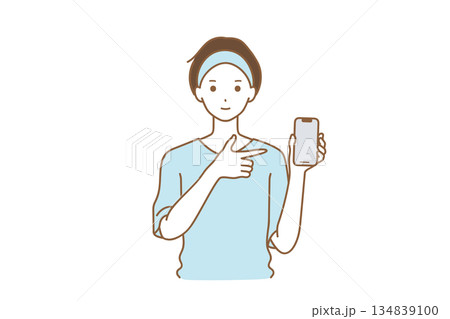 スマホを指さす男性 134839100