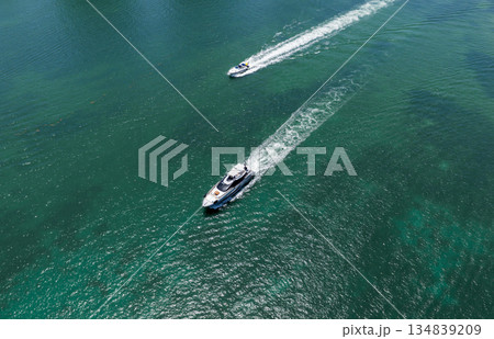 Aerial view motorboat. Yacht boat tour. Luxury boat yachting in summer. Motorboat sailing at sea. Luxury private yacht in sea. Motor yacht luxury vessel. Boat motor aerial. Vacation on summer 134839209