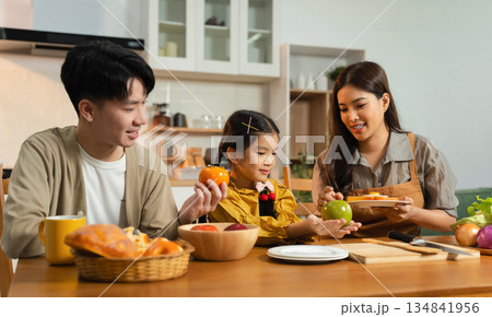 Family Asian spending happy time together on vacation, daughter homework on holiday. Family Asian spending happy time together on vacation, daughter homework on holiday. 134841956