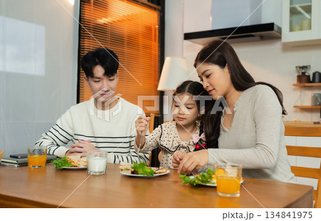 Family Asian spending happy time together on vacation, daughter homework on holiday. Family Asian spending happy time together on vacation, daughter homework on holiday. 134841975