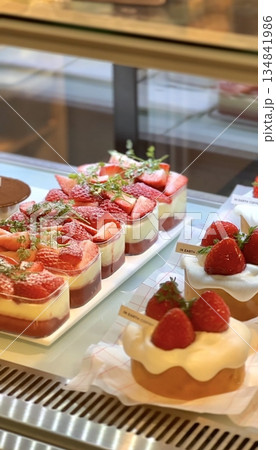 Beautiful and delicious pastries displayed in a bakery, with colorful glazes, delicate toppings, and tempting textures. Offering a perfect visual feast of sweetness and artisanal charm. Beautiful and delicious pastries displayed in a bakery, with colorful glazes, delicate toppings, and tempting textures. Offering a perfect visual feast of sweetness and artisanal charm. 134841986