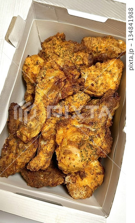 Crispy fried chicken with golden, crunchy skin and juicy, tender meat. A delicious and savory dish, perfect for any meal, served with dipping sauces or side dishes for extra flavor! Crispy fried chicken with golden, crunchy skin and juicy, tender meat. A delicious and savory dish, perfect for any meal, served with dipping sauces or side dishes for extra flavor! 134841988
