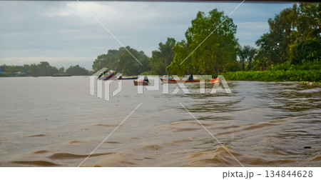 Beautiful view of Mertapura River floating market, South Kalimantan, Indonesia 134844628
