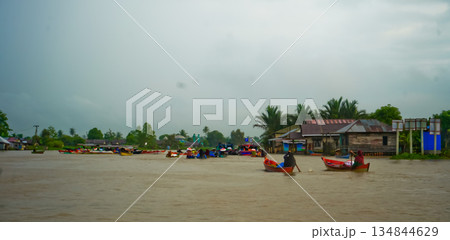 Beautiful view of Mertapura River floating market, South Kalimantan, Indonesia 134844629