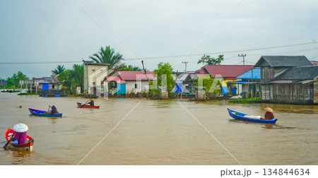 Beautiful view of Mertapura River floating market, South Kalimantan, Indonesia 134844634