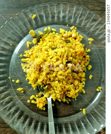 Traditional Indian Poha Breakfast with Vegetables Traditional Indian Poha Breakfast with Vegetables 134845057