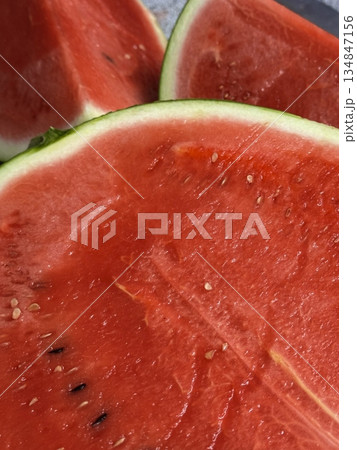 Fresh and juicy watermelon slice with a vibrant red color and sweet, refreshing taste. Perfect for hydrating on a hot day or adding a fruity touch to desserts and drinks. Fresh and juicy watermelon slice with a vibrant red color and sweet, refreshing taste. Perfect for hydrating on a hot day or adding a fruity touch to desserts and drinks. 134847156