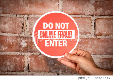 Do Not Online Fraud Enter Warning Sign Held Against Brick Wall 134848635
