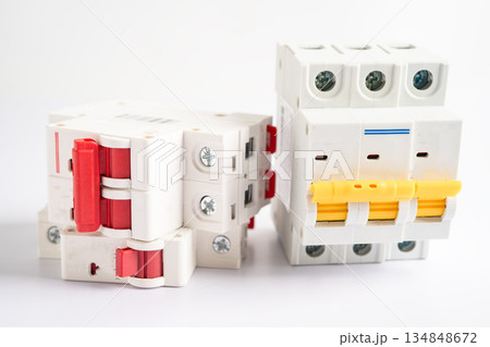 Automatic circuit breaker on white background, control and protect electrical power system. Automatic circuit breaker on white background, control and protect electrical power system. 134848672