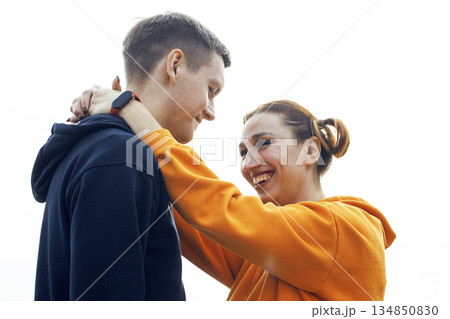 young caucasian couple tourists having fun on sea side, lifestyle people concept young caucasian couple tourists having fun on sea side, lifestyle people concept 134850830