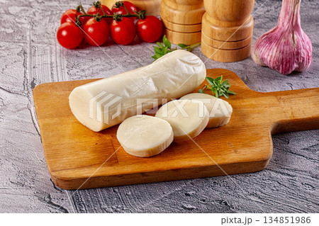 Italian dairy - mozzarella cheese with slices Italian dairy - mozzarella cheese with slices 134851986