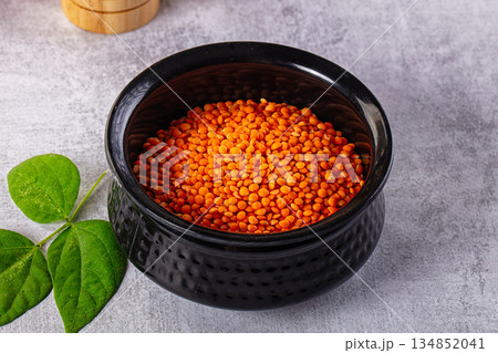 Raw dry red lentil in the bowl 134852041