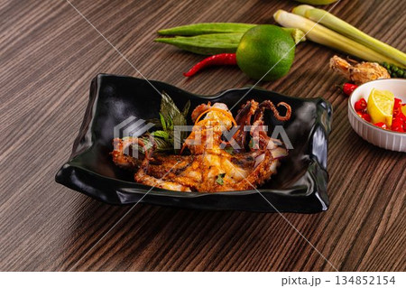 Gourmet grilled whole octopus served lime Gourmet grilled whole octopus served lime 134852154