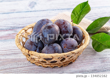 Juicy sweet ripe blue plums 134852162