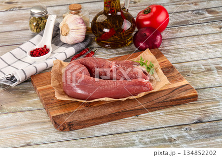 Raw pork tenderloin for cooking Raw pork tenderloin for cooking 134852202