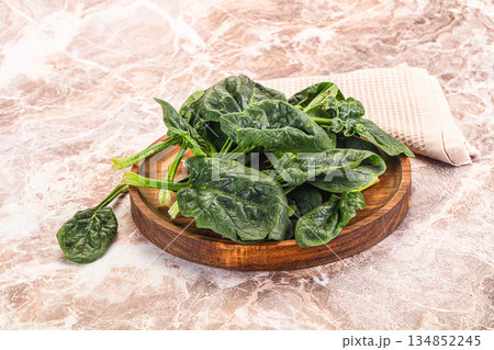Fresh green spinach leaves heap Fresh green spinach leaves heap 134852245
