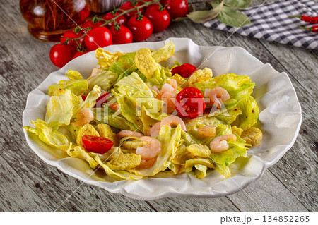 Caesar salad with prawn and parmesan 134852265