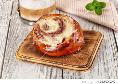 Glazed cinnabon swirl with icing Glazed cinnabon swirl with icing 134852325