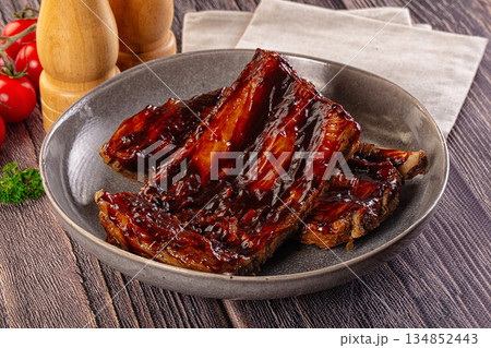 Grilled pork ribs with barbecue sauce Grilled pork ribs with barbecue sauce 134852443