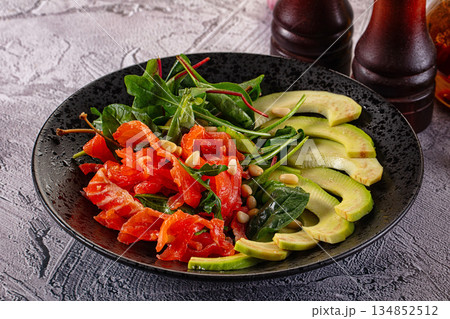 Dietary salad with salmon and avocado 134852512