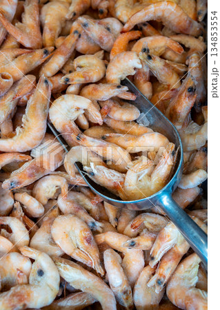 Frozen Shrimp In Metal Scoop At Market, Fresh Seafood For Cooking Frozen Shrimp In Metal Scoop At Market, Fresh Seafood For Cooking 134853554