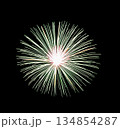 Green fireworks on black background for celebration and anniversary 134854287