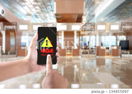 Human hand holding a smartphone displaying a 404 error message with a blurred background. The image symbolizes connection issues, lost information, and the frustrations of digital technology Human hand holding a smartphone displaying a 404 error message with a blurred background. The image symbolizes connection issues, lost information, and the frustrations of digital technology 134855097
