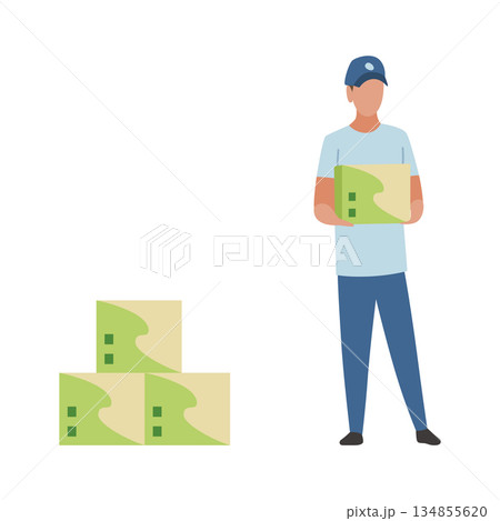 A delivery man is carefully holding a box next to a large pile of boxes 134855620