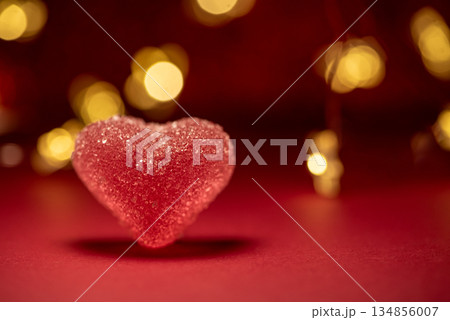Pink Sugar Heart on Red Background with Bokeh Lights. Valentine's Day Celebration Pink Sugar Heart on Red Background with Bokeh Lights. Valentine's Day Celebration 134856007