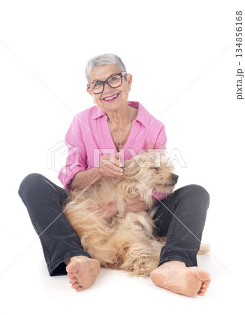 Pyrenean Sheepdog and woman in studio Pyrenean Sheepdog and woman in studio 134856168