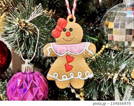 Bright Christmas Tree toys are hanging on the tree 134856979