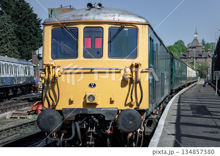 View of A train engine or Locomotive and railway coaches in the Tunbridge Wells railway station. 134857380