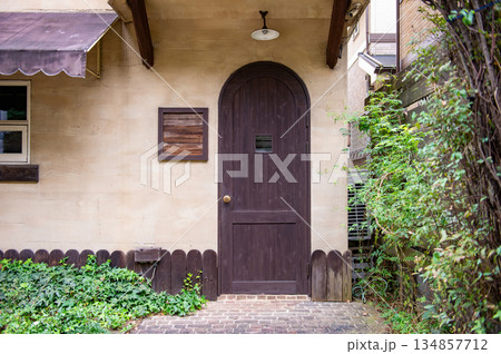 sidewalk by street wall  and  door 134857712