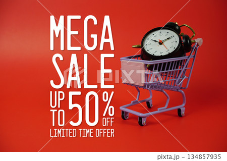Mega Sale 50% off Promotion and Marketing with trolley shopping cart and alarm clock on red background Mega Sale 50% off Promotion and Marketing with trolley shopping cart and alarm clock on red background 134857935