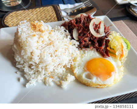 Classic Filipino Breakfast Corned Beef, Garlic Rice, and Fried Egg Cornsilog 134858111