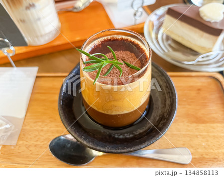 Vietnamese Egg Coffee Dessert with Rosemary Garnish 134858113